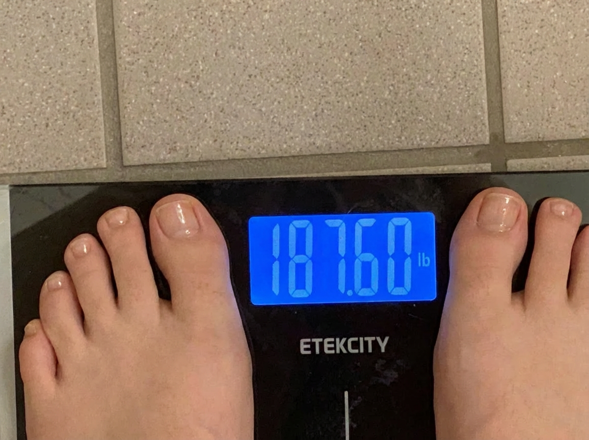 Patient's home scale reading — 187.6 lbs, unchanged